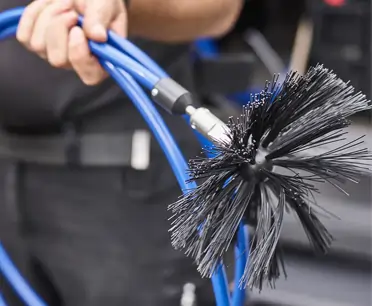 Close-up of rotary duct cleaning brush